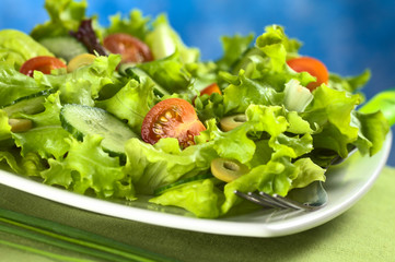 Salad made of cherry tomato, cucumber, green olives