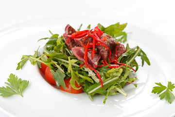 salad with arugula and beef