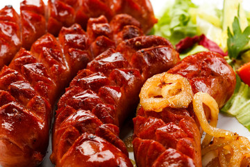 Grilled sausages and vegetables