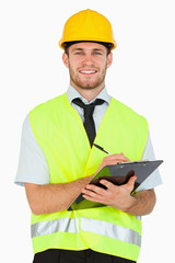 Smiling young foreman with his clipboard