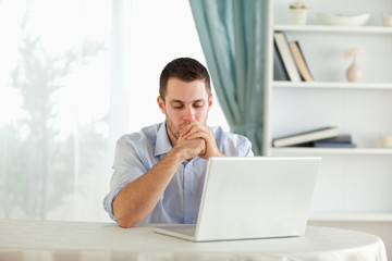 Businessman reading on his notebook