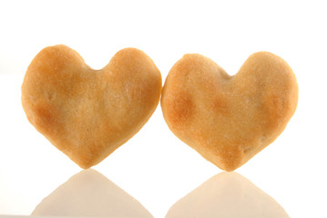 Heart cookies couple with reflection.