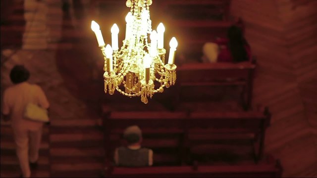 People listening mass in the church