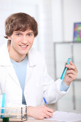 Fototapeta premium Portrait of a chemistry student