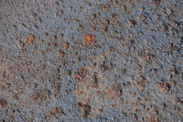 Heavily corroded iron texture, the color of rust