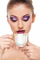Beauty portrait with cup of tea