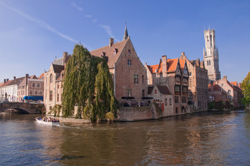 Belgium - Brugge - View of old houses and canal with boat