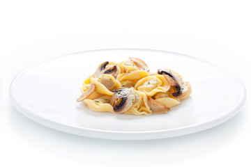 Tortellini dish with sauteed mushrooms and garlic