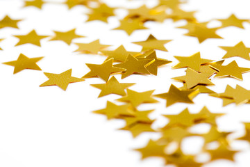 Christmas decoration of golden confetti stars