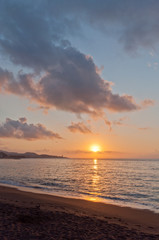 Fototapeta na wymiar Sunrise on the beach Malagueta, Andalucia