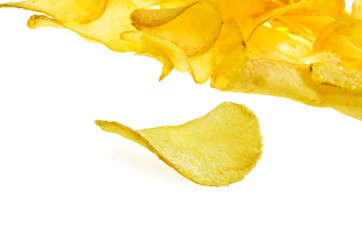Naklejka premium potato chips on the white background