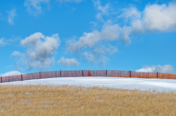 Protective Snow Fence in Field
