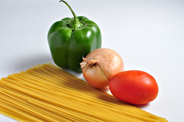 Spaghetti pasta, pepper. onion and tomato.