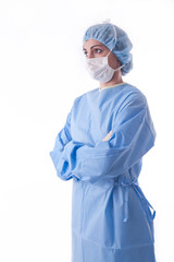 sterile femal nurse or sugeon waiting looking to the side
