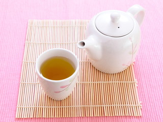 healthful green tea and teapot for afternoon tea time