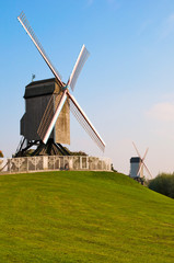 Two Wind mill and green lawn at Brugge - Belgium