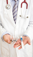 doctor's hand and ovulating injector