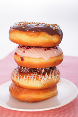 A stack of donuts on a white background