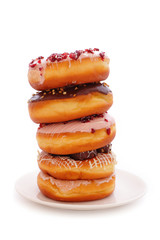 A stack of donuts on a white background