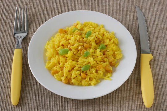 rice with corn on plate
