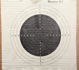 target with holes from bullets