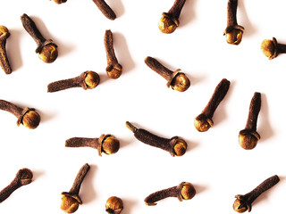close up of cloves on white