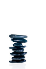 balanced zen stones isolated on white background
