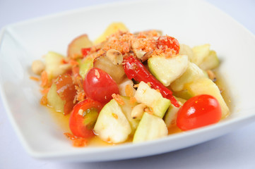 .Fresh fruits salad spicy on white background