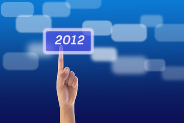 hand pressing 2012 button