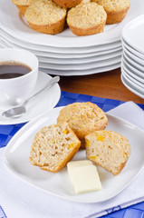 Homemade Peach Muffins Served with Butter and Coffee