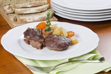 Slow Cooked Beef Shank Served with Vegetables and Bread