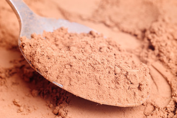 Cocoa  powder  and  steel  spoon