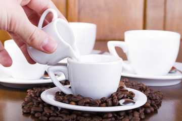 Pouring the milk in a cup