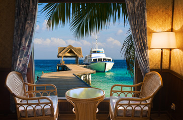 Hotel room and tropical landscape