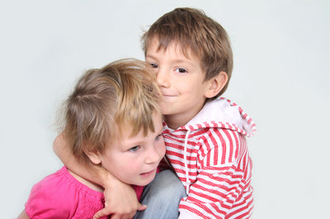 young brother and sister studio shot