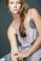 Beautiful fashion model with long curly hair.