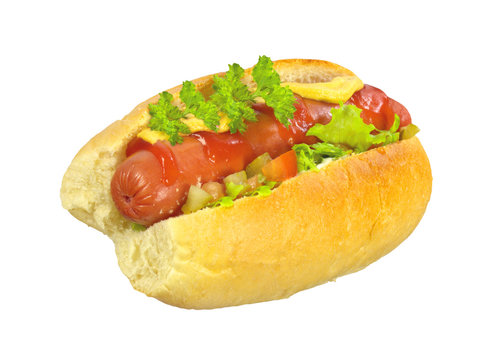 Delicious hot dog with mustard, ketchup and lettuce isolated on