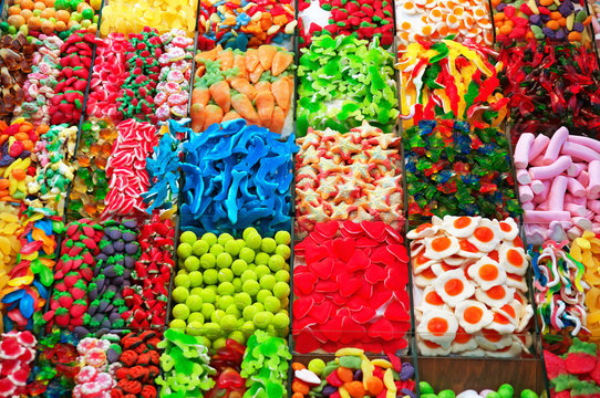 Stall with sweets at Boqueria Market in Barcelona.