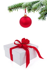 Christmas  tree over gift with red ribbon