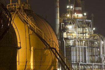 Oil-refinement plant and gas storage tanks