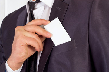 Hand holding an empty business card