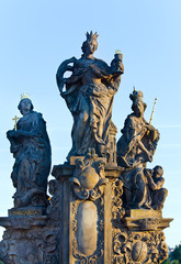 The statue on Charles Bridge (Prague, Czech Republic). - obrazy, fototapety, plakaty