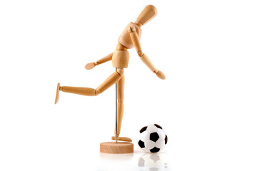 a wooden model is football on a white background