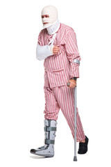 Injured man walking on crutches