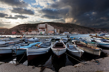 Fototapeta na wymiar fish boats in bay, Balaklava, Crimea