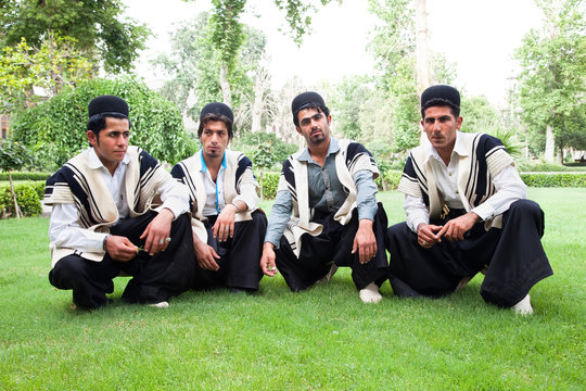 Traditional dressed iranian men posing, Tehran