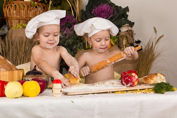 Kids dressed as chefs cooking