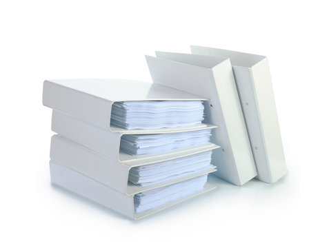 Stack Of Documents In White Binders Isolated