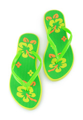 a pair of green beach sandals