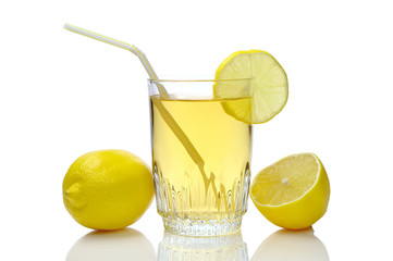 Glass of juice and lemons